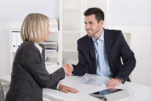 business woman shakes hands with her EPO insurance broker