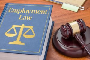 gavel and employment law book that teaches EEOC compliance