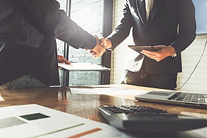 a handshake between two new business partners