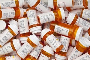 prescription bottles to represent an overview of pbm's and prescription drug practices in 2019