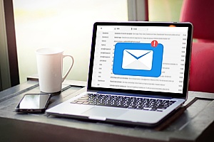 a business email inbox containing benefits package information