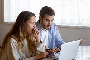 Couple going over unexpected balance billing