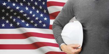 engineer with flag on background united states of america
