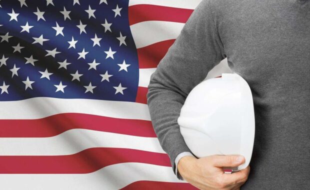 engineer with flag on background united states of america