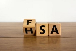 fsa and hsa concept in wooden cubes
