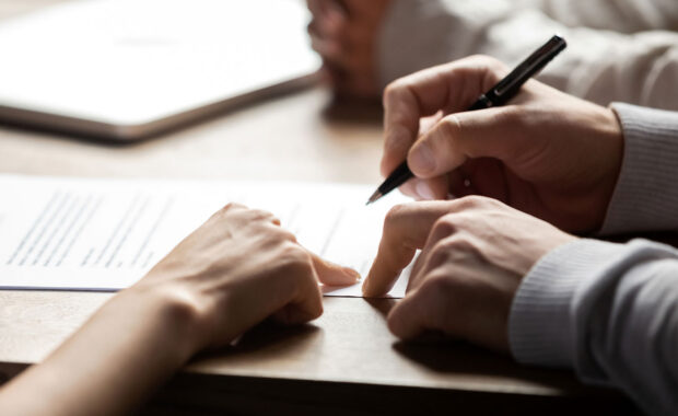 a broker and an organization siging a broker compensation disclosure agreement