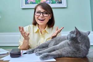 employee with cat in office