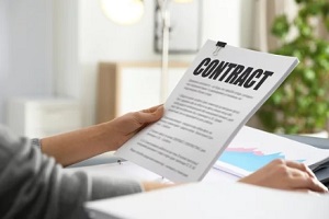 man reading contract papers