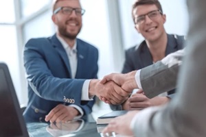 successful business people shaking hands
